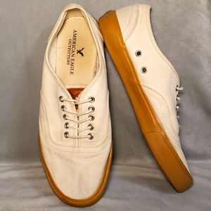 American Eagle Outfitters Cream Colored canvas loafers.